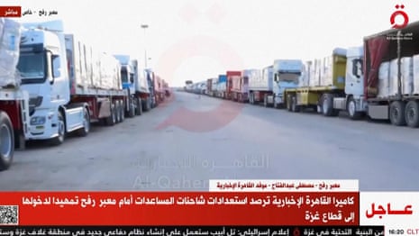 Aid lorries line up at Rafah border in preparation to cross into Gaza – video