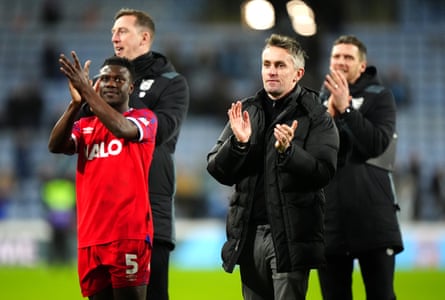 Ipswich manager Kieran McKenna applauds the fans after their win at Coventry