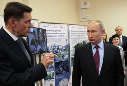 Alexei Mordashov talks to Vladimir Putin while visiting a college in Cherepovets, Russia, in 2020