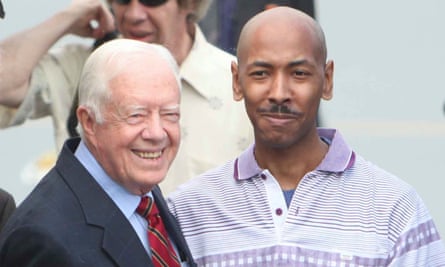 Jimmy Carter and Aijalon Gomes, imprisoned in North Korea for nearly seven months, preparing to leave Pyongyang in August 2010.