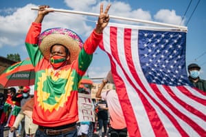 St Paul, US. A member of the Oromo community marches in protest after the death of the musician and activist Hachalu Hundessa, who was murdered in Ethiopia on 29 June. His death has sparked protests around the world
