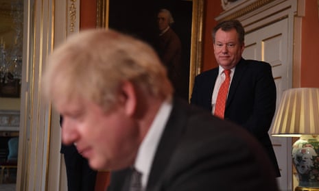 David Frost, right, looks on as Boris Johnson signs the Brexit trade and cooperation agreement at No 10 in December 2020