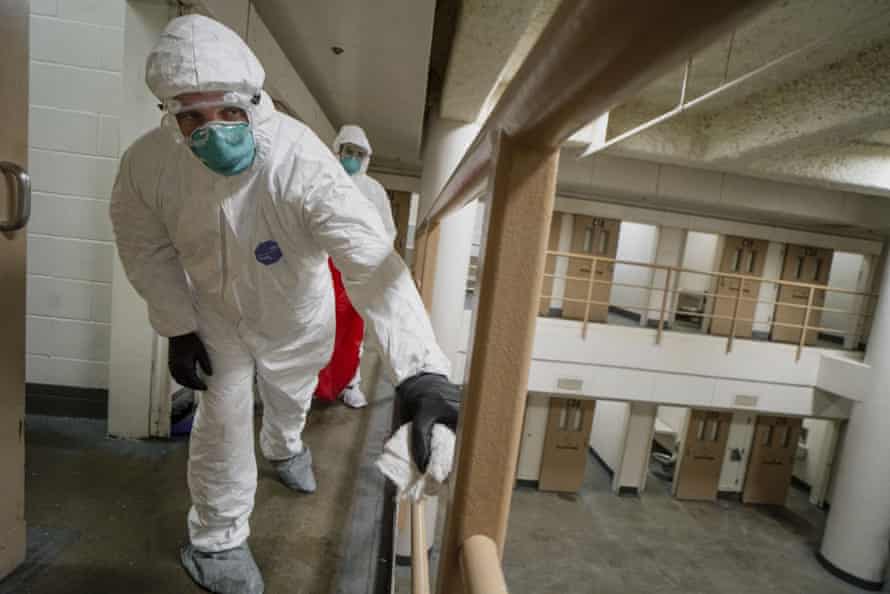 Incarcerated people perform a deep cleaning on a cell pod at the San Diego County Jail.