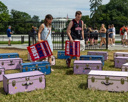 Pink trunks people in background in Washington