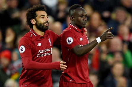 Liverpool's Sadio Mané celebrates with Mohamed Salah after a goal against Huddersfield in 2019