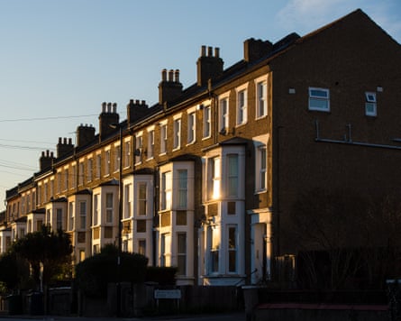 A general view of terraced residential houses in south east London bathed in early morning sun