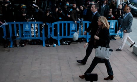 Princess Cristina and her husband Iñaki Urdangarin arrive at court in Palma, Mallorca, on Monday.