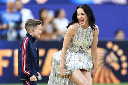 Katy Perry performs with Tius Luka before the World Cup match between USA and Paraguay at Los Angeles Stadium