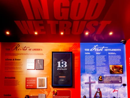 ‘In God We Trust’ written on the ceiling of an exhibit about the roots of America