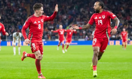 Harry Wilson (left) celebrates after scoring Wales's fourth goal.
