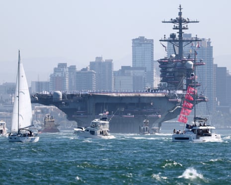 The USS Abraham Lincoln aircraft carrier returns to the San Diego bay after a record-breaking deployment.Photograph: Karl Anderson/AP