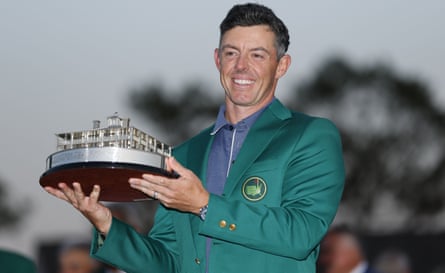 Rory McIlroy holds up the Masters trophy after winning at the Augusta National Golf Club.