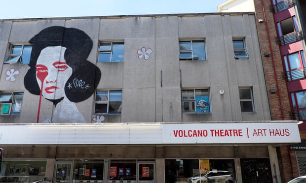 Exterior view of mural on wall of Volcano Theatre Art Haus on Wind Street in the city of Swansea