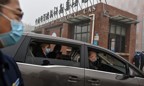 A WHO team investigating the origins of Covid-19 arrive at the Wuhan Institute of Virology in February 2021.