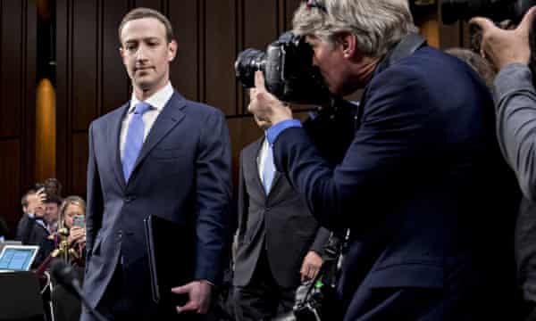 Mark Zuckerberg arrives to testify with a senate committee in April this year