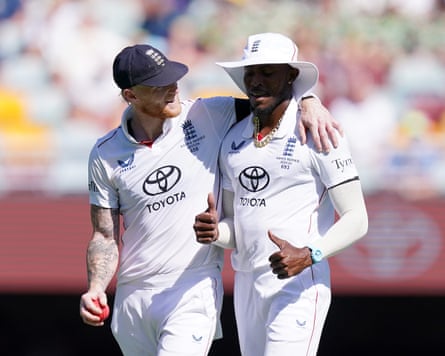 England captain ’s Ben Stokes (left) puts his arm round Jofra Archer