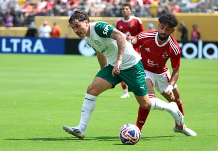 Mauricio (L) of Palmeiras in action against Marwan Attia of Al Ahly during the FIFA Club World Cup 2025 match between Palmeiras and Al Ahly in East Rutherford, New Jersey.
