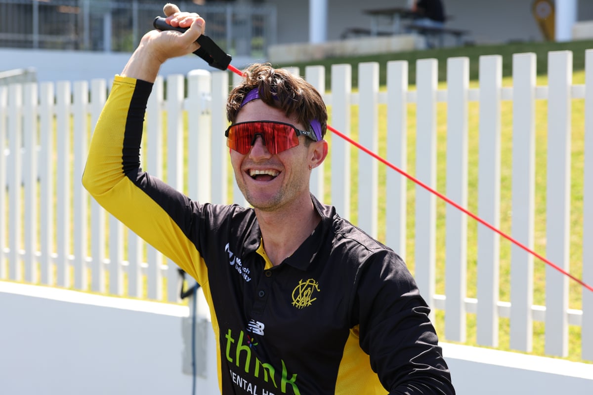Cameron Bancroft uses an exercise band