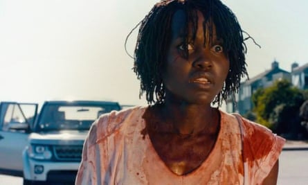 Gobstopping satire ... Lupita Nyong’o in the film US.