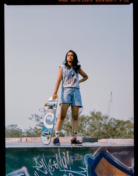 Tulika holding skateboard