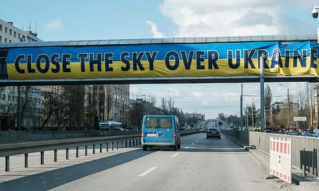 A banner with a message in English reading “Close the sky over Ukraine” is seen over a road in Dnipro yesterday.