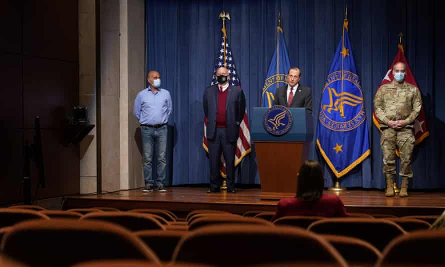Health and human services secretary, Alex Azar, (second from right), speaks during a news conference on Covid-19 vaccine distribution on Tuesday.