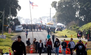 Protesters gather at Ihumātao as they stand to fight a proposed Fletcher Building housing development in Auckland, New Zealand. 