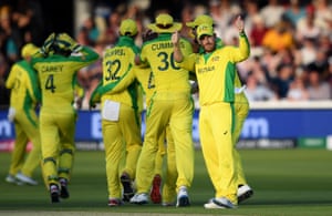 Finch signals a thumbs up to the changing room after successfully dismissing De Grandhomme.