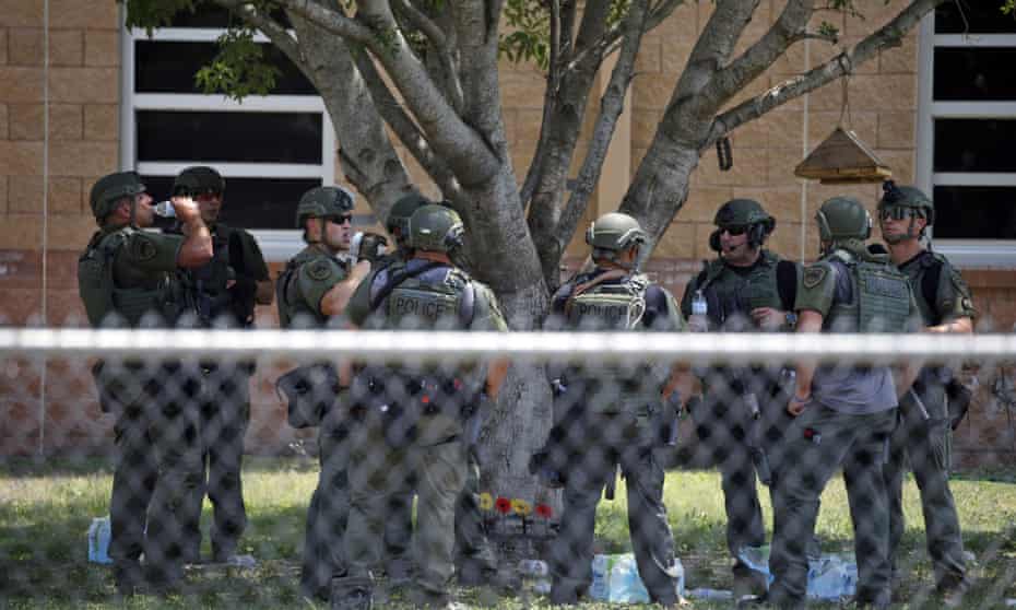 Law enforcement outside Robb elementary school on 24 May, the day of the shooting. 