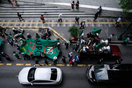 Demonstrators march during a protest against the International Monetary Fund (IMF) and World Bank Group in Bangkok on October 16, 2026, as the IMF Annual Meetings take place in the Thai capital.