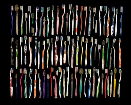 ‘There was such chaos, I had an instinct to make things as organised and neat as I could’: a shot of 83 toothbrushes found in the Calais mud.