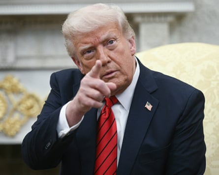 Donald Trump takes questions from members of the media as he meets with Italian Prime Minister Giorgia Meloni in the Oval Office