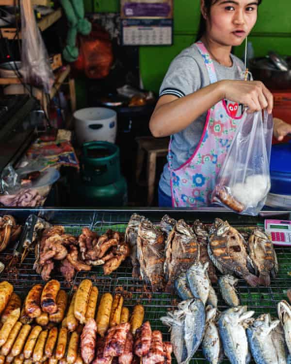 Sausages and fish on a stand at Sompet market, Chiang Mai, Thailand