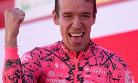 Rigoberto Urán celebrates on the podium after winning stage 17 of the Vuelta a España.