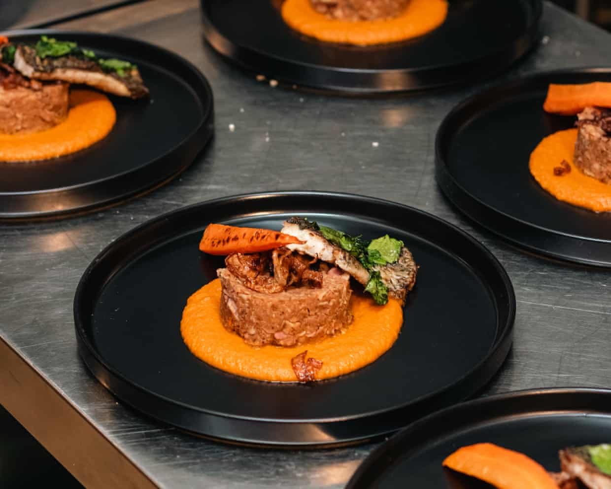 A number of identical, beautifully prepared dishes