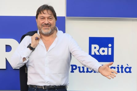 Sigfrido Ranucci in front of a Rai publicity sign