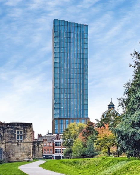 A 82-metre glass tower block which is the tallest building in Newcastle surrounded by a green space.