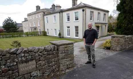 Dunstan Low in front of his house in Lancashire