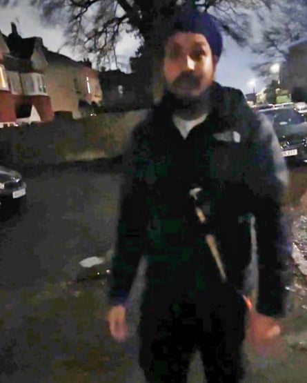 Digwa pictured wearing a sheathed knife.