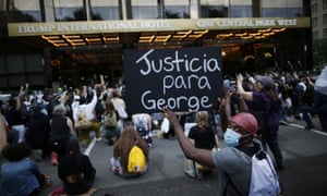 People protest against the death of George Floyd at Trump International Hotel on 2 June.