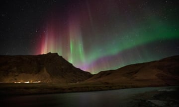 Northern Lights over Iceland<br>The aurora borealis, also known as the Northern Lights, fill the sky over Skogafoss waterfall on the Skoga River in the south of Iceland. Picture date: Sunday March 31, 2024. PA Photo. Photo credit should read: Owen Humphreys/PA Wire