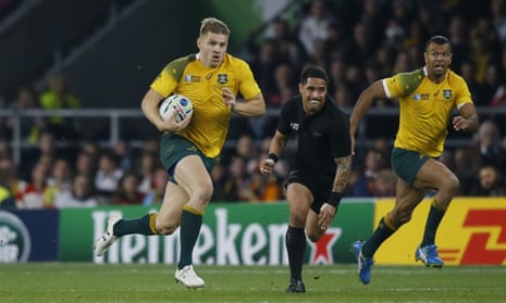 Drew Mitchell runs with the ball as Australia try to find a way back into the match.