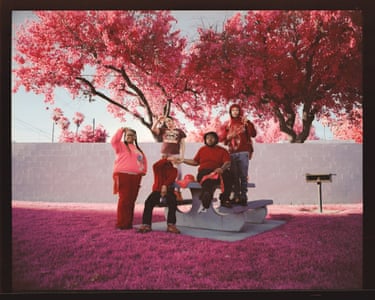 A group of figures under a tree