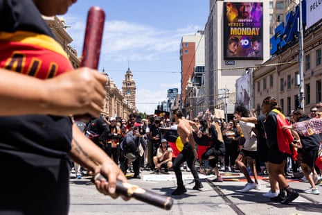 People participate at the Invasion Day rally in Melbourne, Australia.