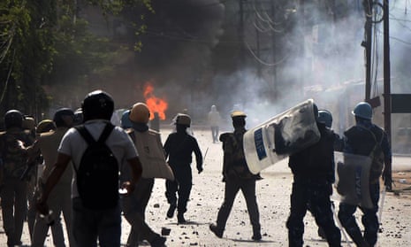 Protesters clash with police in Prayagraj, Uttar Pradesh, India.