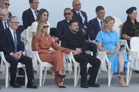 Keir Starmer (left) at the Bastille Day parade with Ukraine's President Volodymyr Zelenskyy (centre right), his wife Olena Zelenska (centre left), and French Assembly president Yael Braun-Pivet (right).
