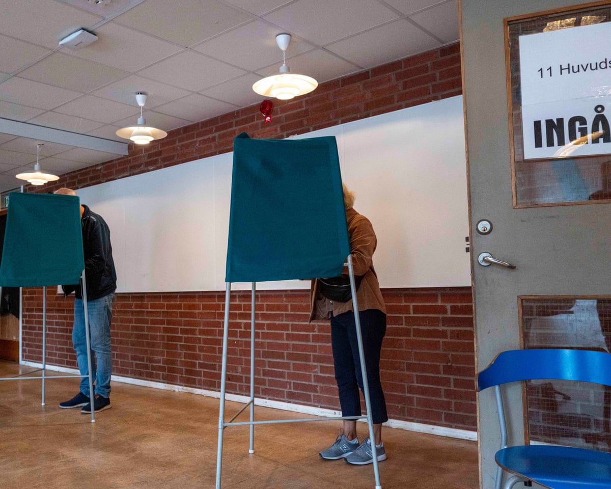 Voters take part in Sweden's general election in the Stockholm region on Sunday.