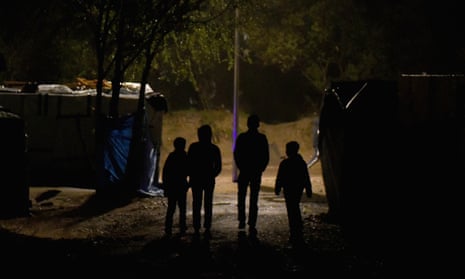 Four children in a refugee camp in Calais