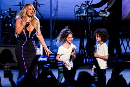 Carey onstage in Atlanta, Georgia, in March 2019, with her children, Monroe and Moroccan Cannon, during her Caution world tour.