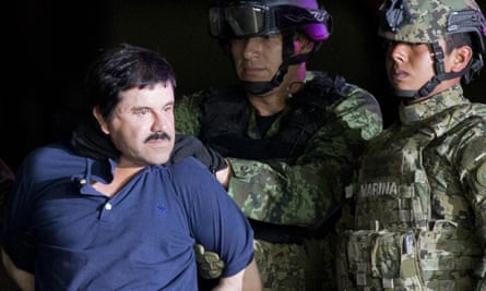 Joaquin ‘El Chapo’ Guzmán in January 2016, being escorted to a helicopter hangar by Mexican soldiers in Mexico City.